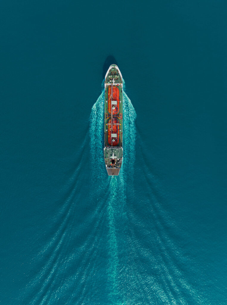 Aerial top view Oil ship tanker carier oil from refinery on the sea.